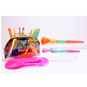 15 brush set of brightly colored makeup application brushes. With holographic small sized cosmetic pouch. Purchase of these items and you get a brush cleaner pad that comes in threee different colors of pink, black, and purple. 